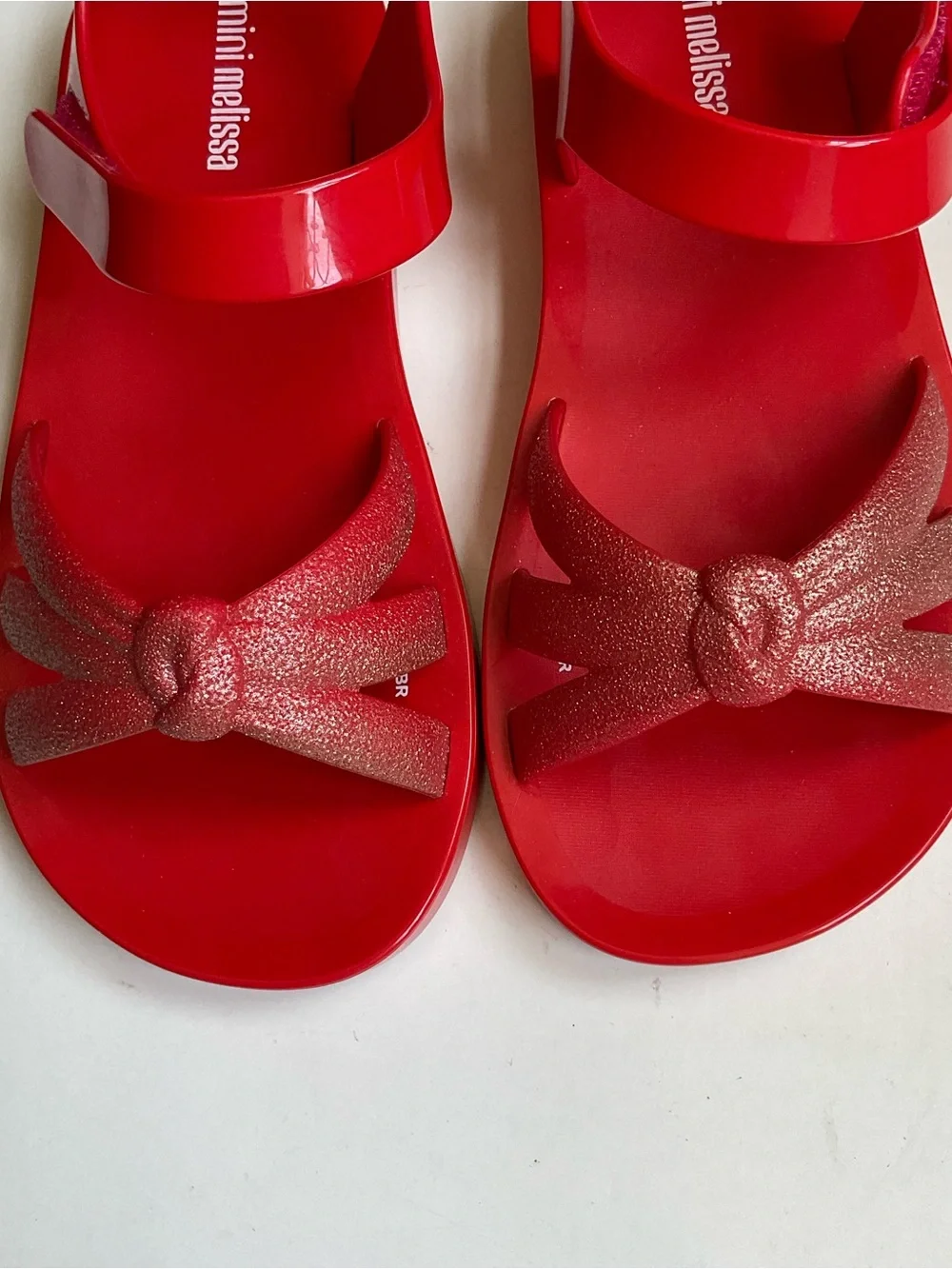 Mini Melissa Red Kids' Sandals with Glitter Bow Accent